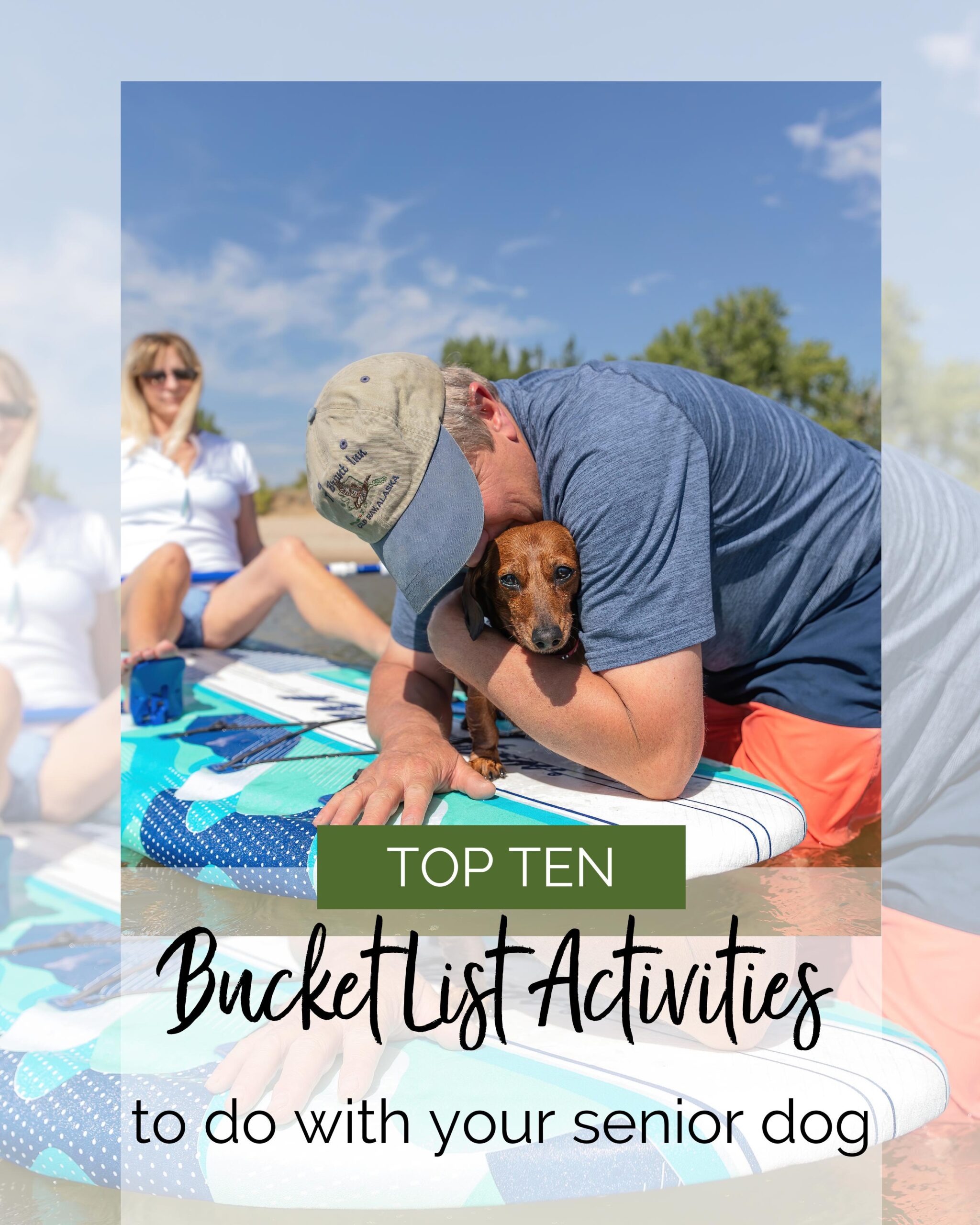 man hugging an old dog on a stand up paddle board